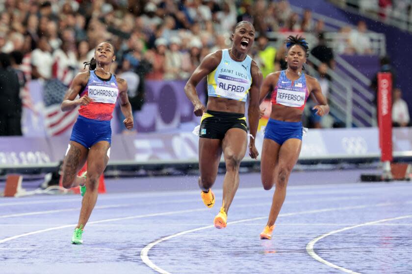 Julien Alfred upsets Sha'Carri Richardson to win women's 100 meters at