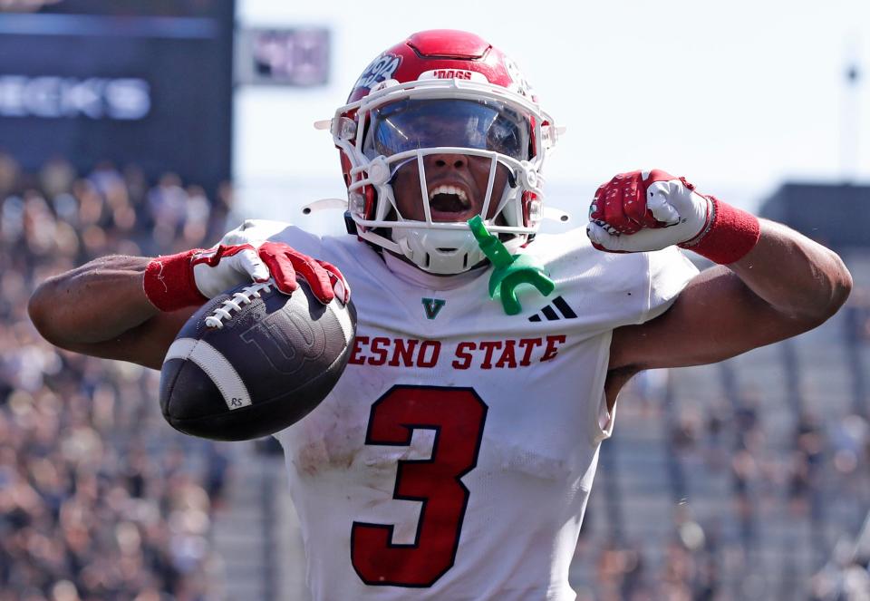 Fresno State Bulldogs wide receiver Erik Brooks (3) celebrates after scoring a touchdown during the NCAA football game against the Purdue Boilermakers, Saturday, Sept. 2, 2023, at Ross-Ade Stadium in West Lafayette, Ind. Fresno State Bulldogs won 39-35.