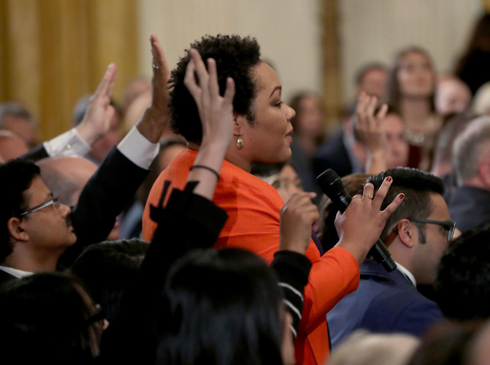 Yamiche Alcindor of PBS NewsHour asks a question to U.S. President Donald Trump after remarks by the President a day after the midterm elections on Nov. 7, 2018 in the East Room of the White House in Washington, D.C. (Photo: Mark Wilson/Getty Images)
