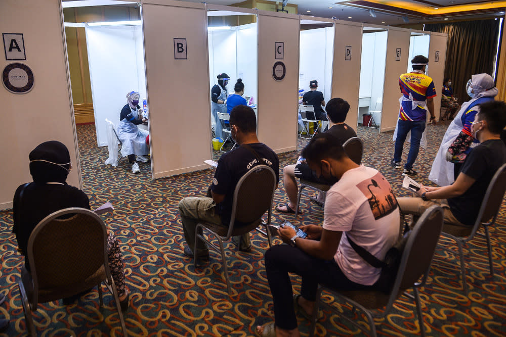 Science, Technology and Innovation Minister Khairy Jamaluddin said 1,655,217 residents in the Klang Valley have been given vaccination appointments under Operation Surge Capacity. — Picture by Miera Zulyana