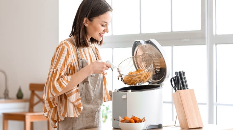 woman with deep fryer