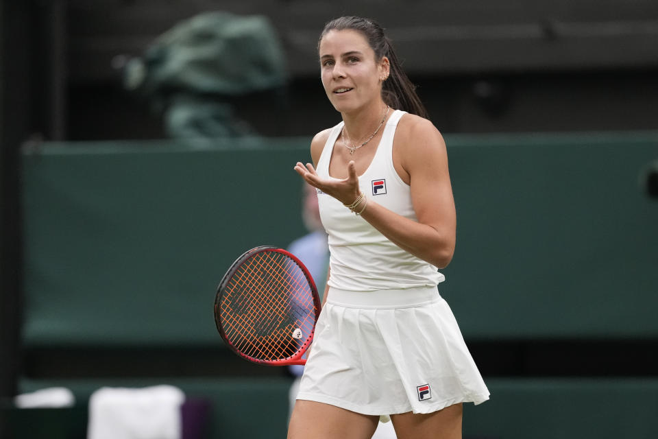 Emma Navarro of the United States reacts after defeating Naomi Osaka of Japan in their match on day three at the Wimbledon tennis championships in London, Wednesday, July 3, 2024. (AP Photo/Alberto Pezzali)