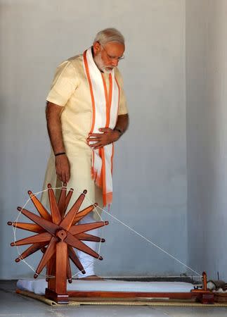 India's Prime Minister Narendra Modi arrives to spin cotton on a wheel during his visit to Gandhi Ashram in Ahmedabad, India, June 29, 2017. REUTERS/Amit Dave