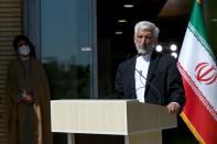 Presidential candidate Saeed Jalili ​​speaks with journalists before the start of the last election debate, in Tehran