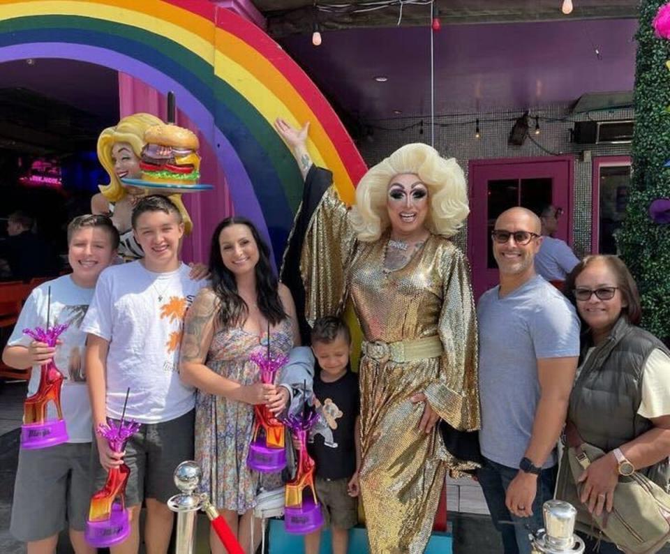 Sparkle Stone poses with her family at Hamburger Mary’s drag brunch (Sparkle Stone)