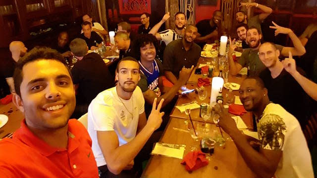 Vitor Galvani takes a selfie at dinner with the French national basketball team. (Facebook)