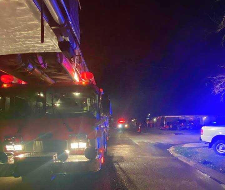 Houma firefighters respond to a house fire on Troy Street that killed one of the home's occupants Thursday night.