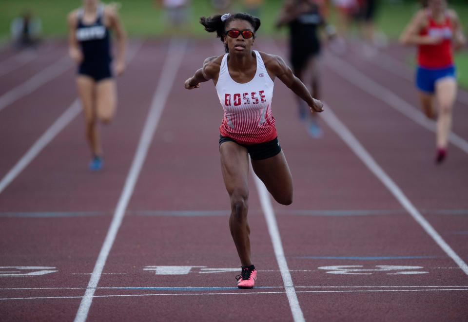 Bosse's Alexia Smith pulls away from the other runners to win the 400 Meter Dash during the IHSAA Girls Track & Field Regionals at the Central High School's Central Stadium Tuesday evening, May 24, 2022.