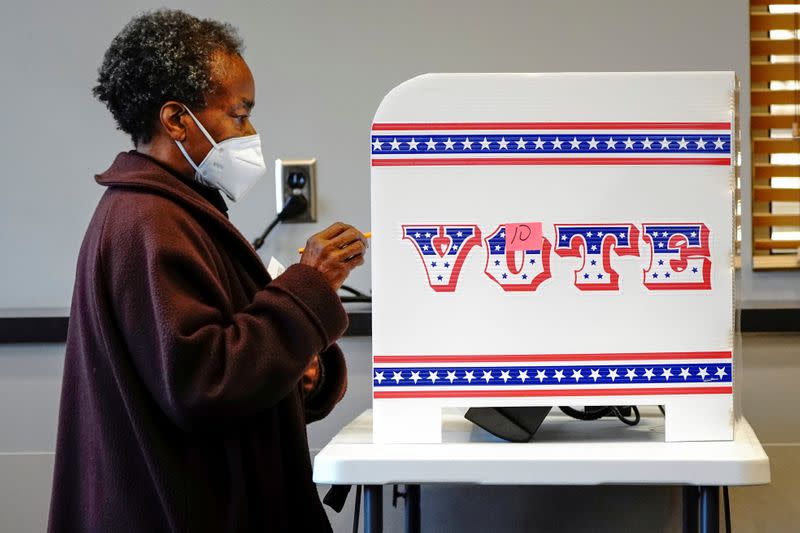 FILE PHOTO: In-person early voting in Milwaukee