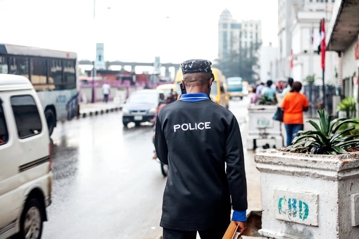 File photo: A police officer walks through the streets of Lagos, Nigeria (Getty Images)