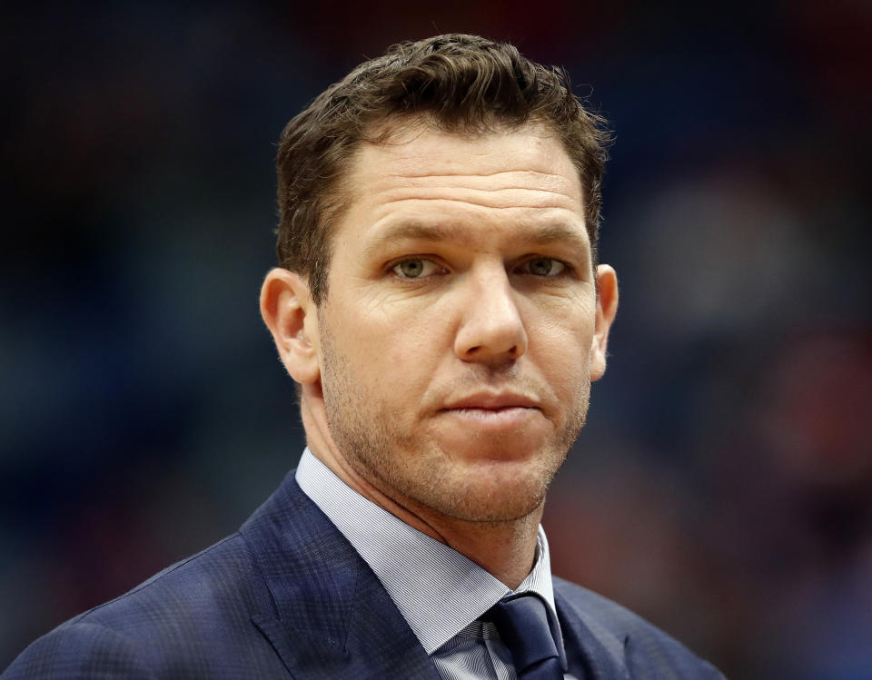 FILE - In this March 31, 2019, file photo, Los Angeles Lakers head coach Luke Walton looks on during the first half of an NBA basketball game in New Orleans. The Sacramento Kings have hired Luke Walton as their coach just days after he parted ways with the Los Angeles Lakers following three losing seasons. The Kings announced Monday, April 15, 2019, that Walton will replace Dave Joerger. (AP Photo/Tyler Kaufman, File)