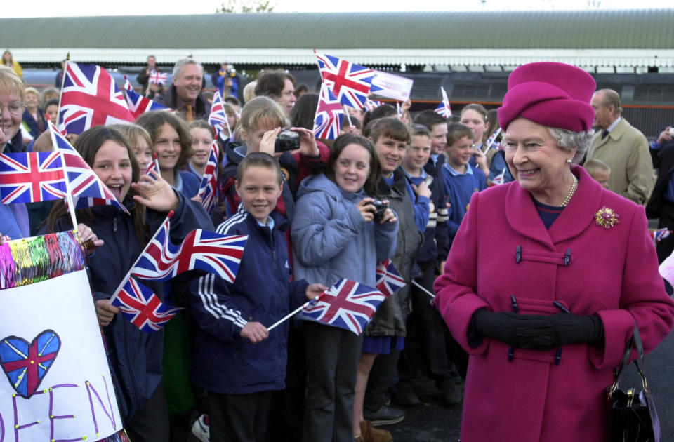 Britain's Queen Elizabeth II smiles at wellwishers as she arrives at Falmouth Station, for the beginning of her nationwide Golden Jubilee tour, which is starting with a two-day visit to the West Country.   *  One of her first engagements Wednesday is the naming of a new lifeboat.  In the coming weeks, the 76-year-old monarch will visit every region of England, Scotland, Wales and Northern Ireland.  