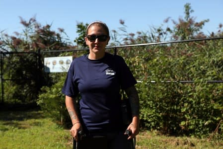 Megan Helsel, a kayaking wildlife specialist, poses outside Mehrhof Pond in Little Ferry, New Jersey