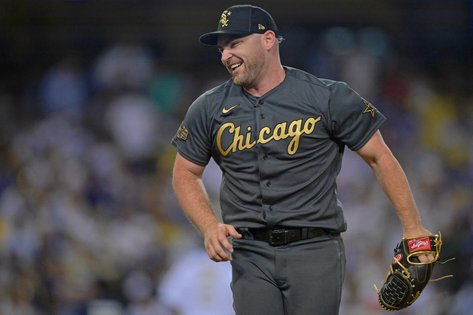 Jul 19, 2022; Los Angeles, California, USA; American League relief pitcher Liam Hendriks (31) of the Chicago White Sox reacts after outfielder Julio Rodriguez (not pictured) of the Seattle Mariners made a catch against the National League for the final out of the eighth inning of the 2022 MLB All Star Game at Dodger Stadium. Mandatory Credit: Jayne Kamin-Oncea-USA TODAY Sports