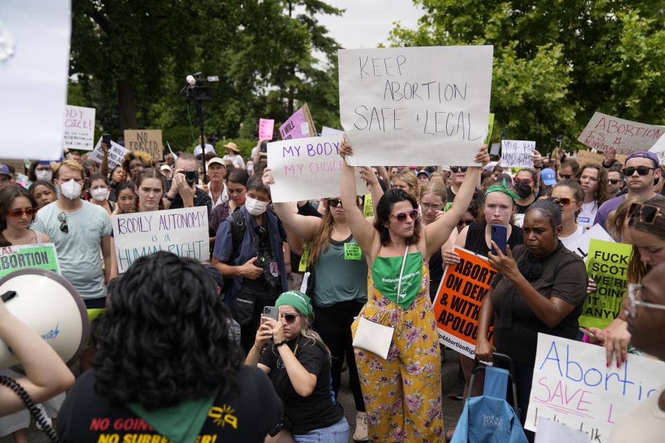 Demonstrators react outside the Supreme Court on June 24, 2022 after the decision in Dobbs v. Jackson Women's Health Organization overturning the landmark 1973 Roe v. Wade decision that established a constitutional right to abortions.