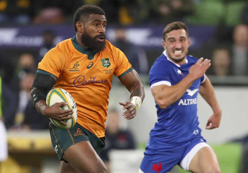 Australia's Marika Koroibete makes a run during the second rugby test between France and Australia in Melbourne, Australia, Tuesday, July 13, 2021. (AP Photo/Asanka Brendon Ratnayake)