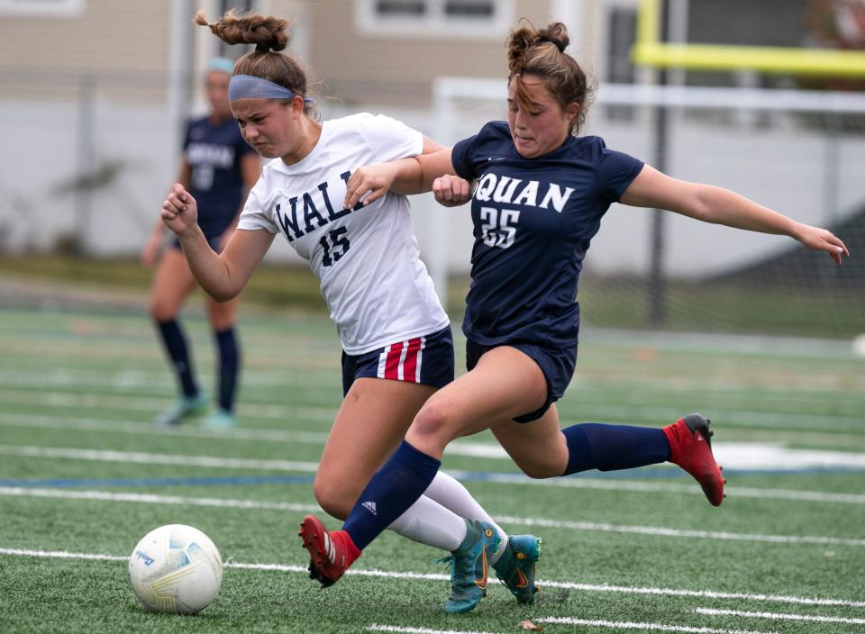 Erin Farrell of Wall and Kali Saito of Manasquan battle for the ball. New Jersey Central Group 2 semifinal soccer between Manasquan and Wall.   Manasquan, NJTuesday, November 1, 2022