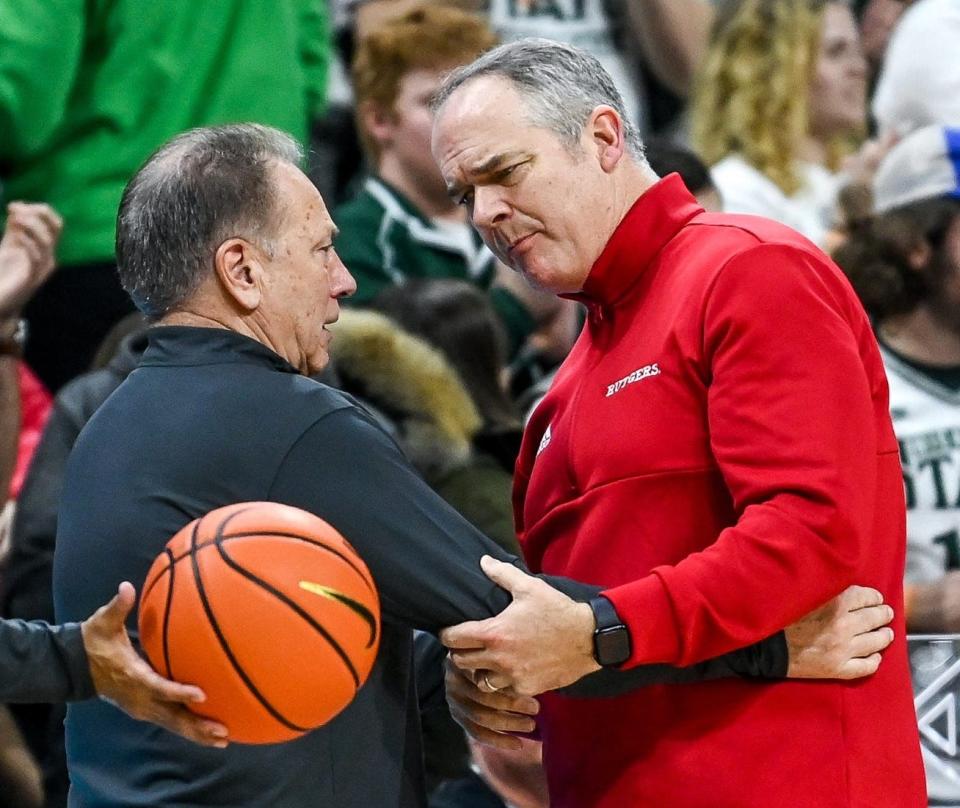 Michigan State's head coach Tom Izzo, left, and Rutgers' head coach Steve Pikiell talk following the Spartans victory over the Scarlet Knights on Thursday, Jan. 19, 2023, at the Breslin Center in East Lansing.