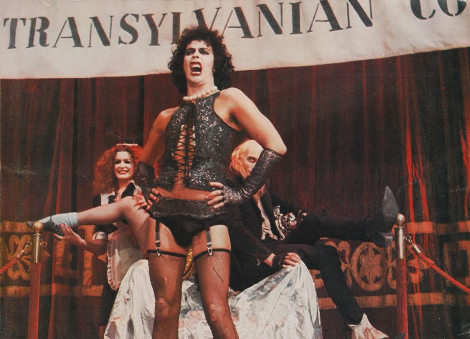 Tim Curry, backed by Patricia Quinn and Richard O'Brien, in "The Rocky Horror Picture Show." (Photo: Movie Poster Image Art via Getty Images)