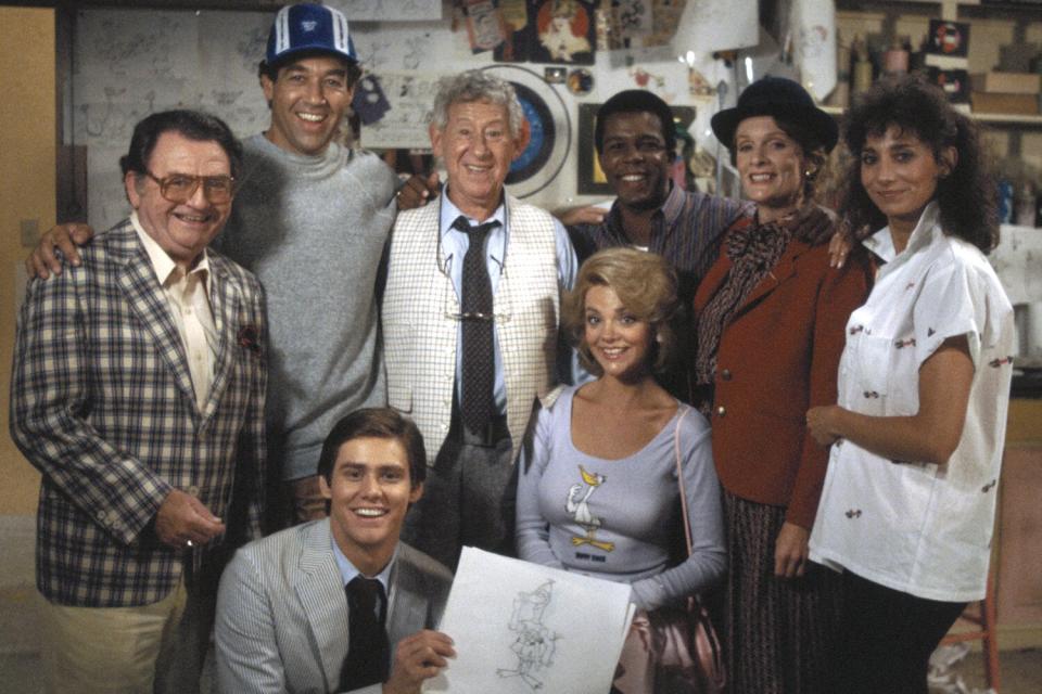 DUCK FACTORY -- Pictured: (l-r) Don Mesick as Wally Wooster, Jay Tarses as Mary Fenneman, Jack Gilford as Brooks Carmichael, Clarence Gilyard, Jr. as Roland Culp, Julie Payne as Aggie Aylesworth, Nancy Lane as Andrea Lewin, (front, l-r) Jim Carrey as Skip Tarkenton, Teresa Ganzel as Mrs. Sheree Winkler