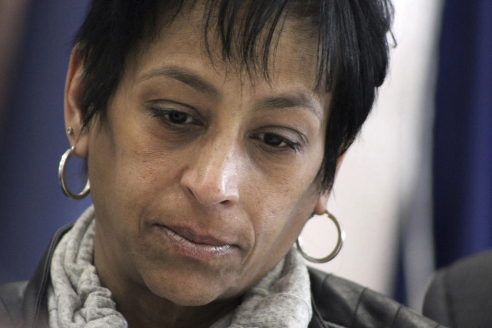 FILE- In this Monday, April 24, 2017 file photo, Evelyn Rodriguez, whose teen-aged daughter was brutally slain by MS-13 gang members in 2016, listens during a news conference by Suffolk County officials in Hauppauge, N.Y. Rodriguez recognized by President Donald Trump at the State of the Union after MS-13 gang members allegedly killed her daughter was struck and killed Friday, Sept. 14, 2018 by a car at the girl's memorial. (AP Photo/Frank Eltman, File)