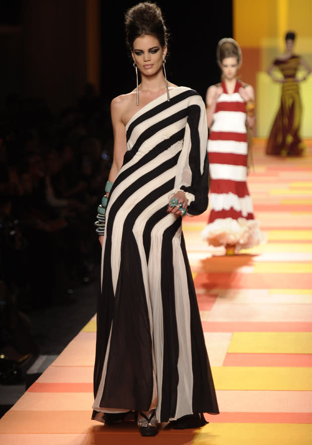 <b>Jean Paul Gaultier SS13 </b><br><br>Dresses were adorned in stripe monochrome print.<br><br>© Rex