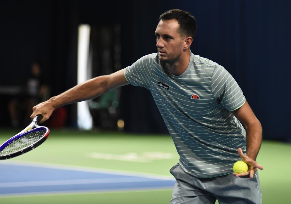 James Ward only landed in England five days ago but overcame jet lag and sleeping problems to win his first match in Weybridge