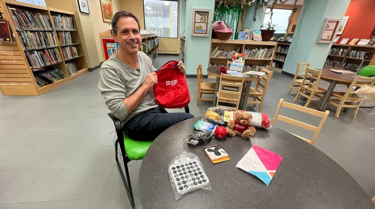 John Mutford, Yellowknife Public Library manager, said the kits are meant to hep neurodivergent people.  (Travis Burke/CBC News  - image credit)