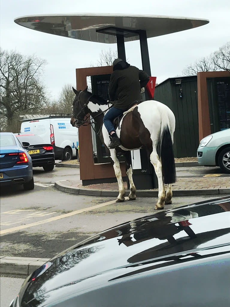 Nothing to see here: Many of the drive-thru customers seemed accustomed to the spectacle (SWNS)