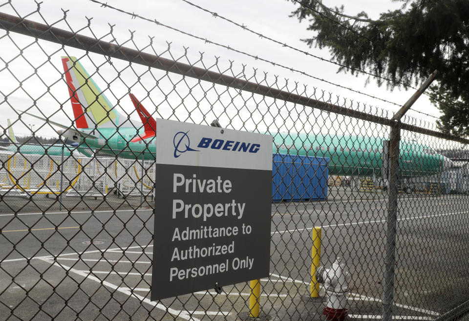 A Boeing 737 MAX 8 being built for for Shanghai Airlines sits parked at Boeing Co.'s Renton Assembly Plant, Monday, March 11, 2019, in Renton, Wash. Airlines in several countries grounded the same model jetliner Monday following Sunday's crash of an Ethiopian Airlines Boeing 737 Max 8, the second devastating crash of one of the planes in five months. (AP Photo/Ted S. Warren)