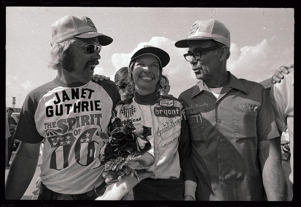 janet guthrie with roses and crew