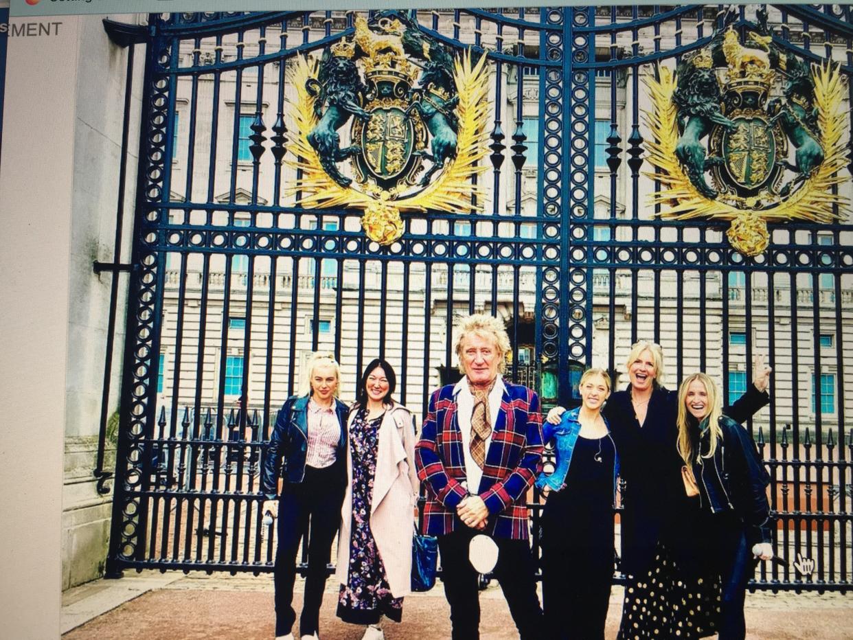 Penny Lancaster posted this Instagram photo of the family at gates of Buckingham Palace.
