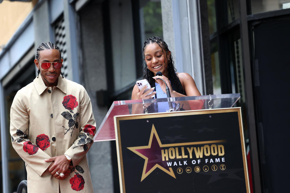 Ludacris listens as his daughter Karma Bridges speaks at the ceremony honoring him with a star on the Hollywood Walk of Fame, on May 18, 2023, in Los Angeles. / Credit: Tommaso Boddi / Getty Images