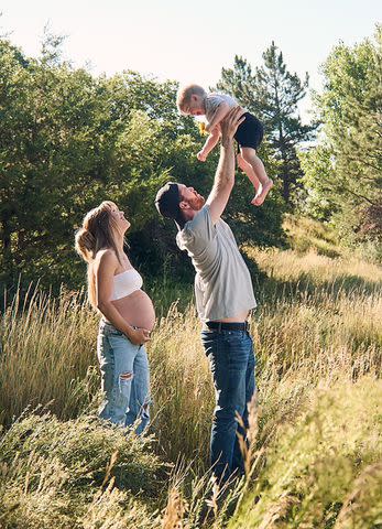 <p>Justus Stroup</p> Justus Stroup with her husband and son while pregnant with her daughter, Sutton