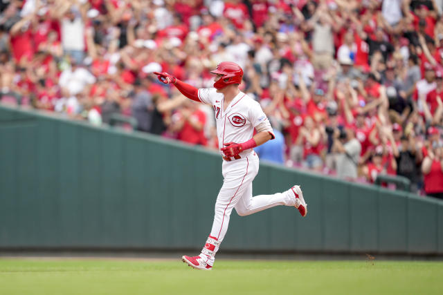 MIAMI, FL - MAY 12: Cincinnati Reds catcher Tyler Stephenson (37) poses of  the camera during his home run celebration in the dugout during the game  between the Cincinnati Reds and the