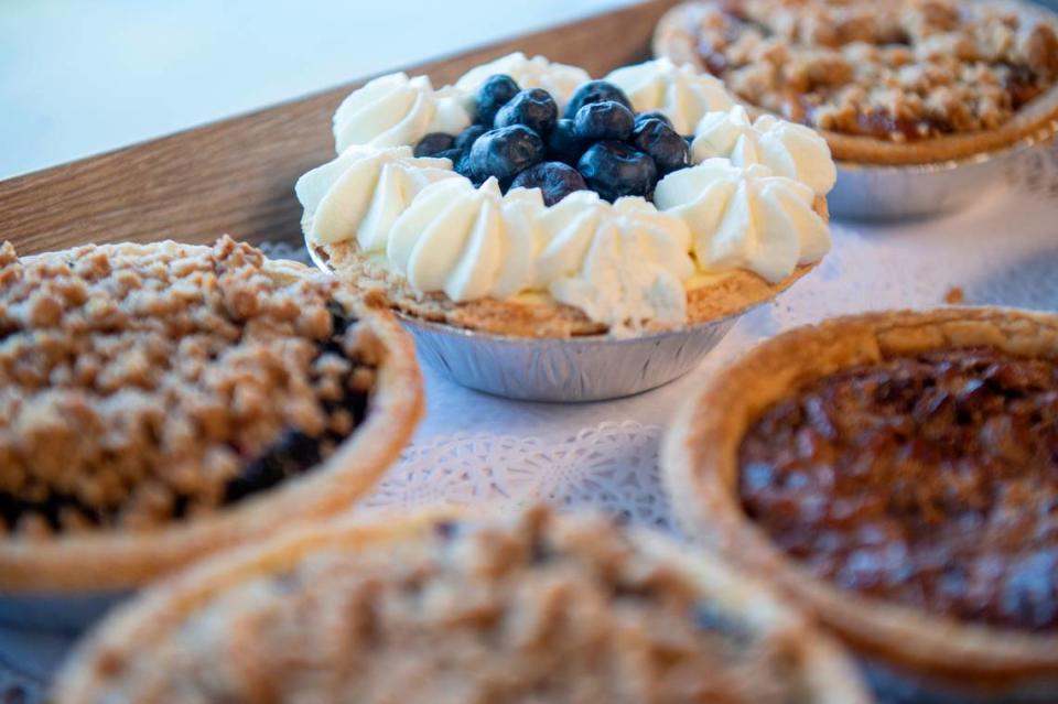 A selection of mini pies, including blueberry, pecan and blackberry available for purchase at Harvest Bay Artisan Bakery in Bay St. Louis on Thursday, Dec. 7, 2023.