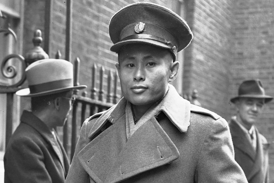 FILE - Gen. Aung San, then leader of the Myanmar government, arrives at 10 Downing Street, the residence and office of Britain's Prime Minister, in London, on Jan. 13, 1947. Myanmar’s military-ruled government and its opponents on Tuesday, July 19, 2022, marked the 75th anniversary of the assassination of independence hero Gen. Aung San, the father of the country’s ousted leader, Aung San Suu Kyi. (AP Photo, File)