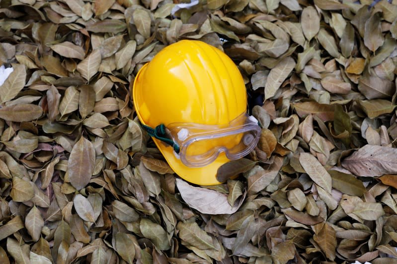 A helmet and goggles lies on the ground at Hong Kong Polytechnic University (PolyU) in Hong Kong, China