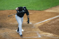 Miami Marlins' Jesus Aguilar throws his bat after a popup left two stranded on base during the seventh inning of a baseball game against the New York Yankees at Yankee Stadium, Friday, Sept. 25, 2020, in New York. (AP Photo/Corey Sipkin)