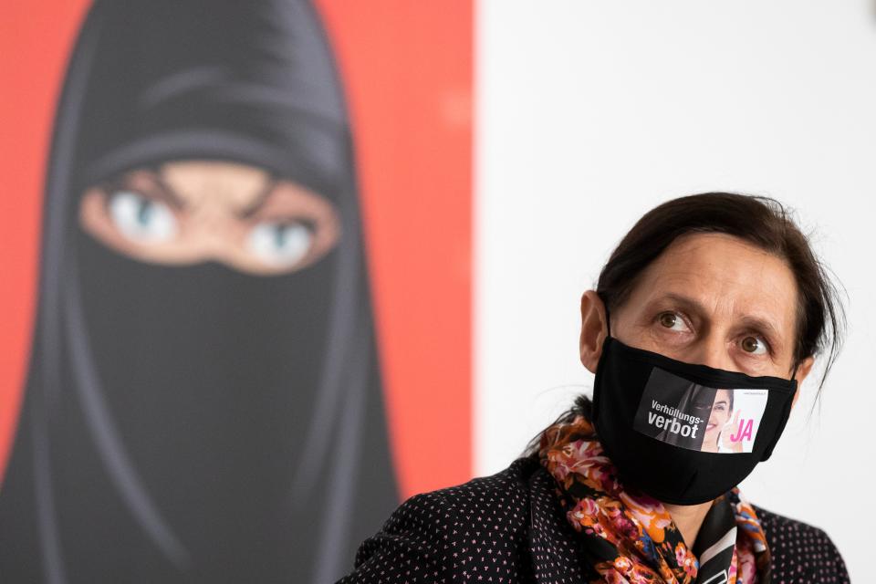 Monika Ruegsegger-Hurschler, National Councillor SVP, gives an interview at the meeting place of the supporters of the initiative to ban face coverings (AP)