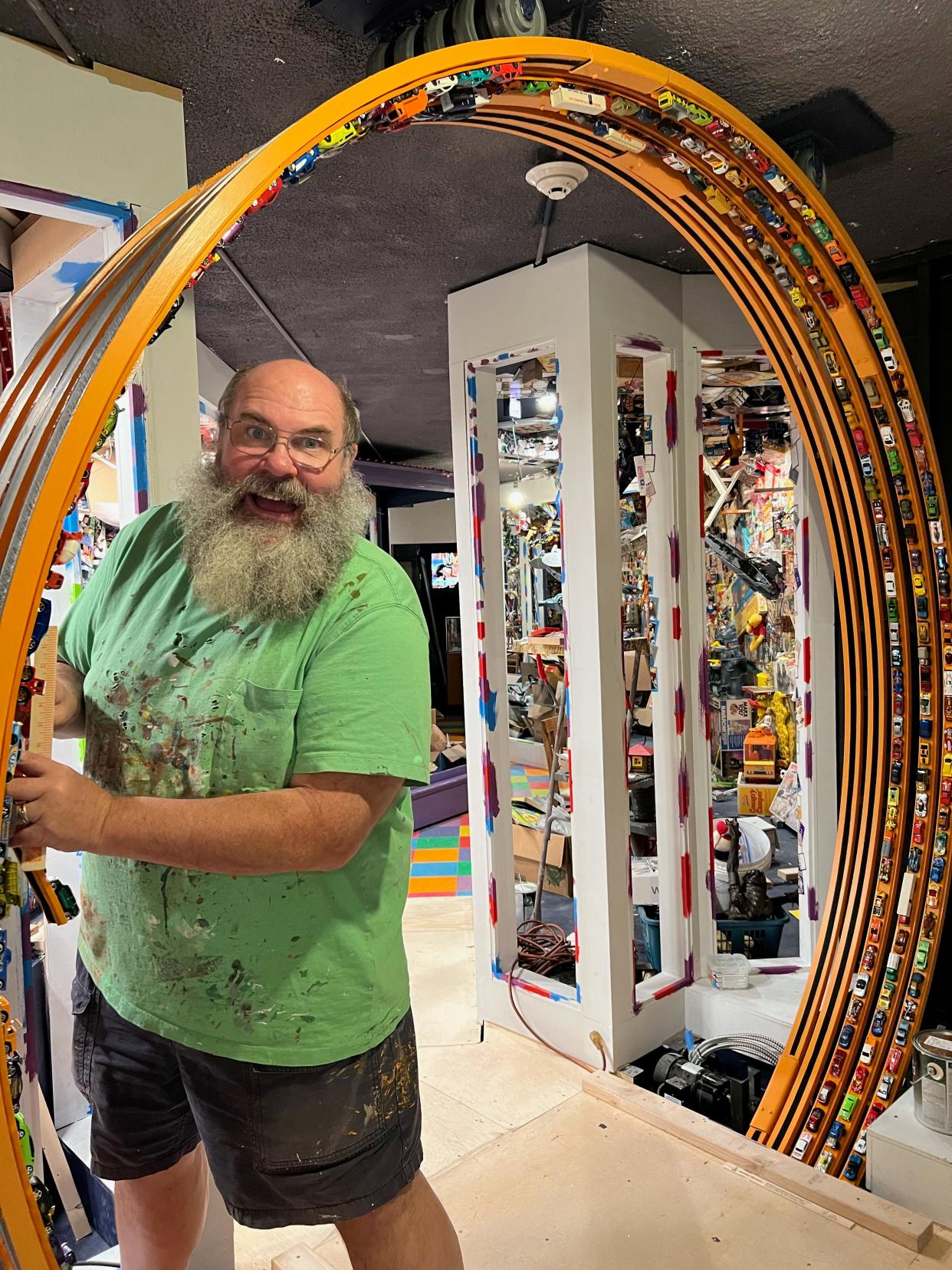 Mark Klaus, founder of Castle Noel in Medina, shows off his new Hot Wheels display.