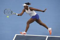 FILE - In this Oct. 6, 2019, file photo, Naomi Osaka, of Japan, hits a return against Ashleigh Barty, of Australia, during their women's final at the China Open tennis tournament in Beijing. Osaka will be competing in the Australian Open tennis tournament, beginning Monday, Jan. 20, 2020.(AP Photo/Ng Han Guan, File)