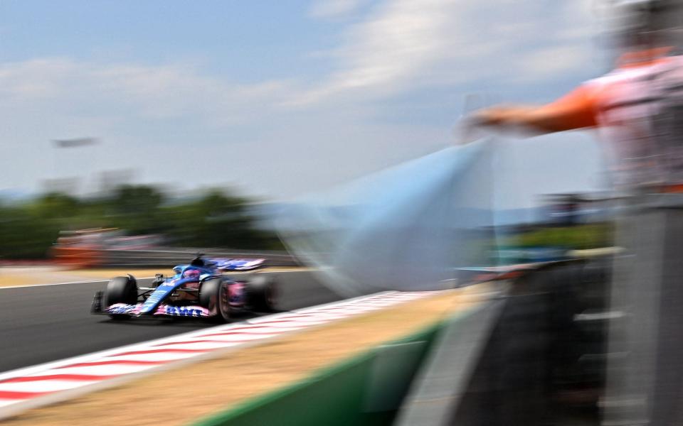 Alpine's Spanish driver Fernando Alonso competes during first practice session ahead of the Formula One Hungarian Grand Prix at the Hungaroring in Budapest, Hungary, on July 29, 2022 - AFP