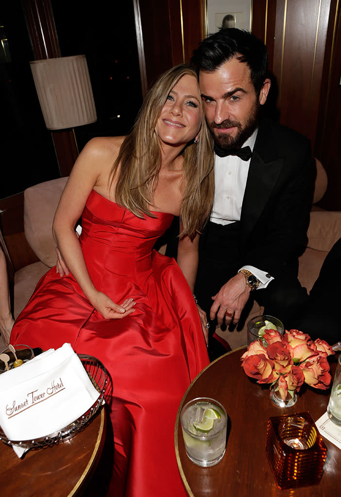 Jennifer Anistson and Justin Theroux attend the 2013 Vanity Fair Oscar Party hosted by Graydon Carter at Sunset Tower on February 24, 2013 in West Hollywood, California.
