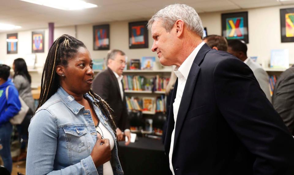 Governor Bill Lee speaks with parent of a third grader, Tenika Fondren about her experience with the school vouchers after a panel consisting of parents, the head of New Hope Christian Academy, and Speaker Cameron Sexton on Wednesday, December 13, 2023 at the New Hope Christian Academy library in Memphis, Tenn.