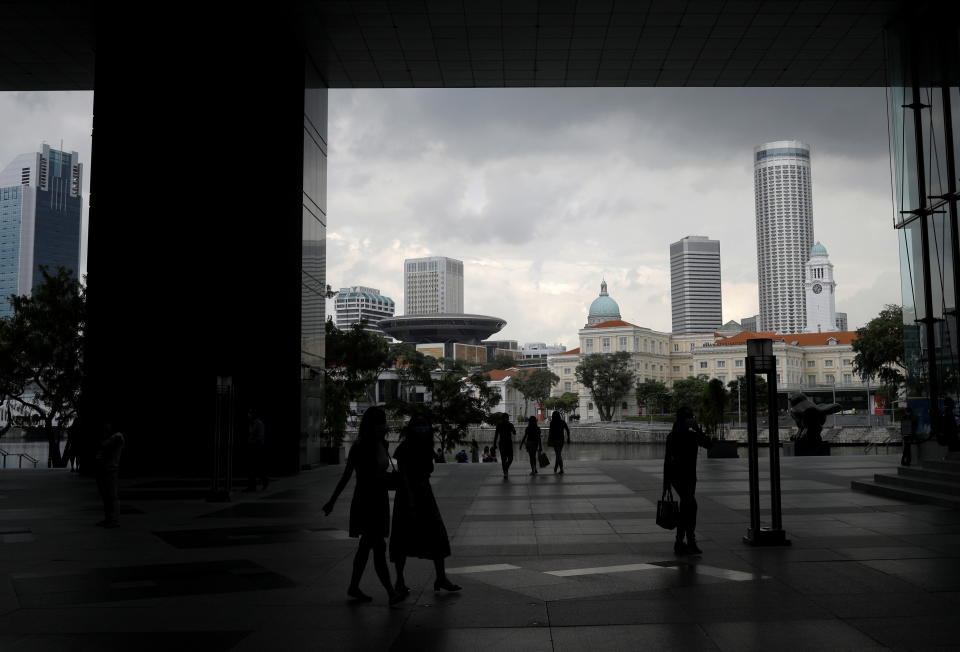 People walking during lunch hour at the central business district in Singapore.