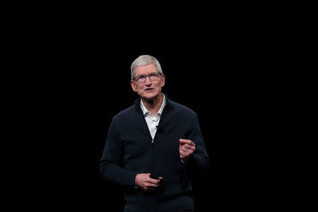 FILE PHOTO: Apple CEO Tim Cook speaks during an Apple launch event in the Brooklyn borough of New York, U.S., October 30, 2018. REUTERS/Shannon Stapleton/File Photo