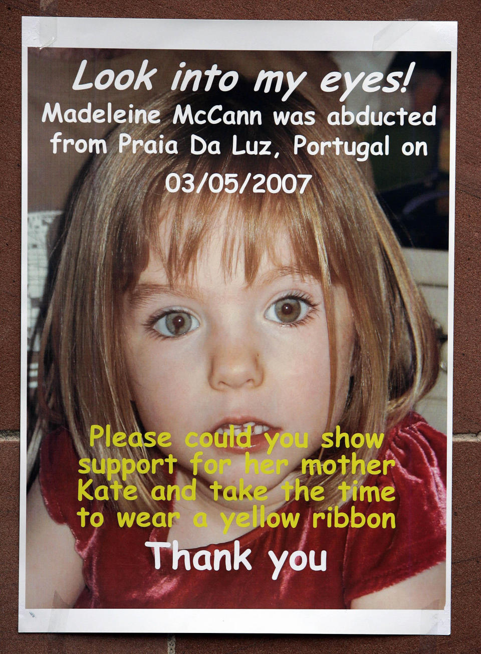 A poster showing missing girl Madeleine McCann in Glasgow where the UEFA Cup Final between two Spanish teams will be held.