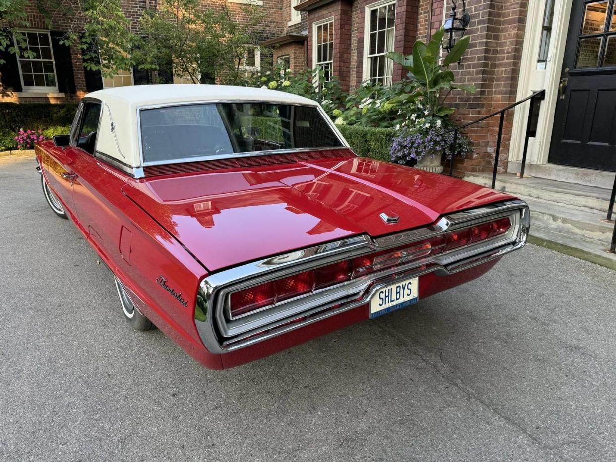 rear photo of a red ford thunderbird coupe