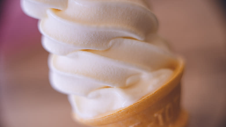 A cone of soft-serve ice cream